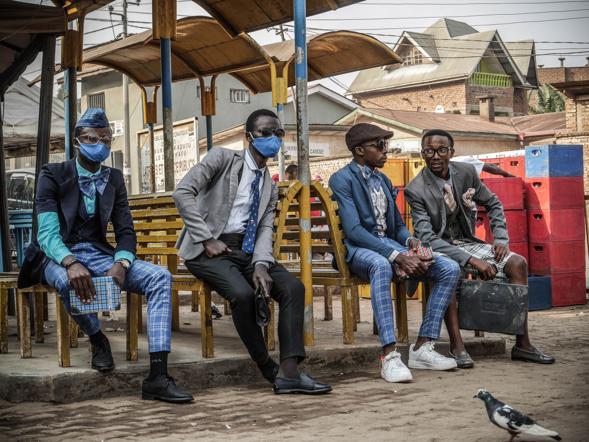 Bukavu, DRC, August 2020. Bukavu’s fashionistas show off their style on a street this month. © Raissa Karama Rwizibuka for Fondation Carmignac