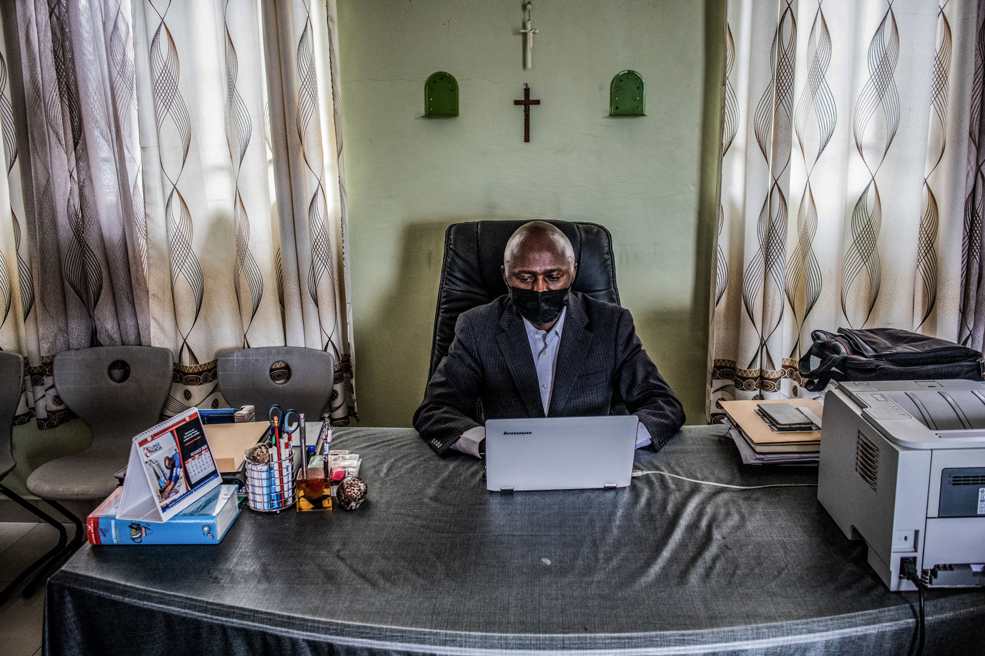 Goma, DRC, February 22nd 2021. Father Jacques Letakamba sits in his office at the Mwanga Institute in the eastern Congolese city of Goma. © Moses Sawasawa for Fondation Carmignac
